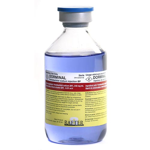 bottle filled with blue liquid dorminal